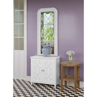 Side table beside white cabinet, hallway view