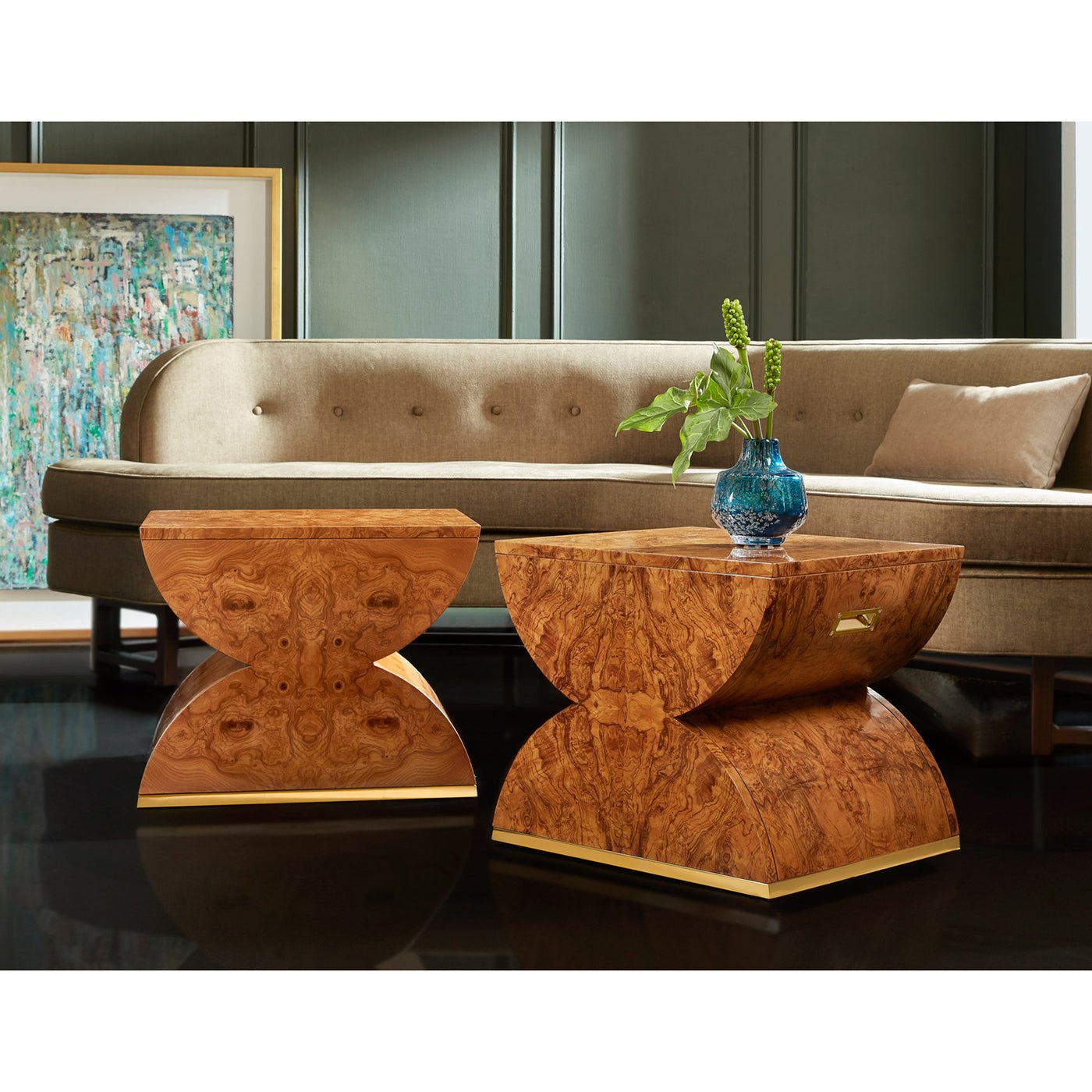 Living room with sofa and Olive Ash Burl accent tables.