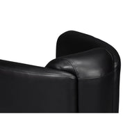 Black leather club chair, top backrest view.