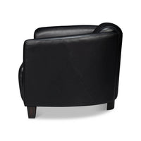 Black leather club chair, side view.