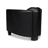 Black leather club chair, back angle view.