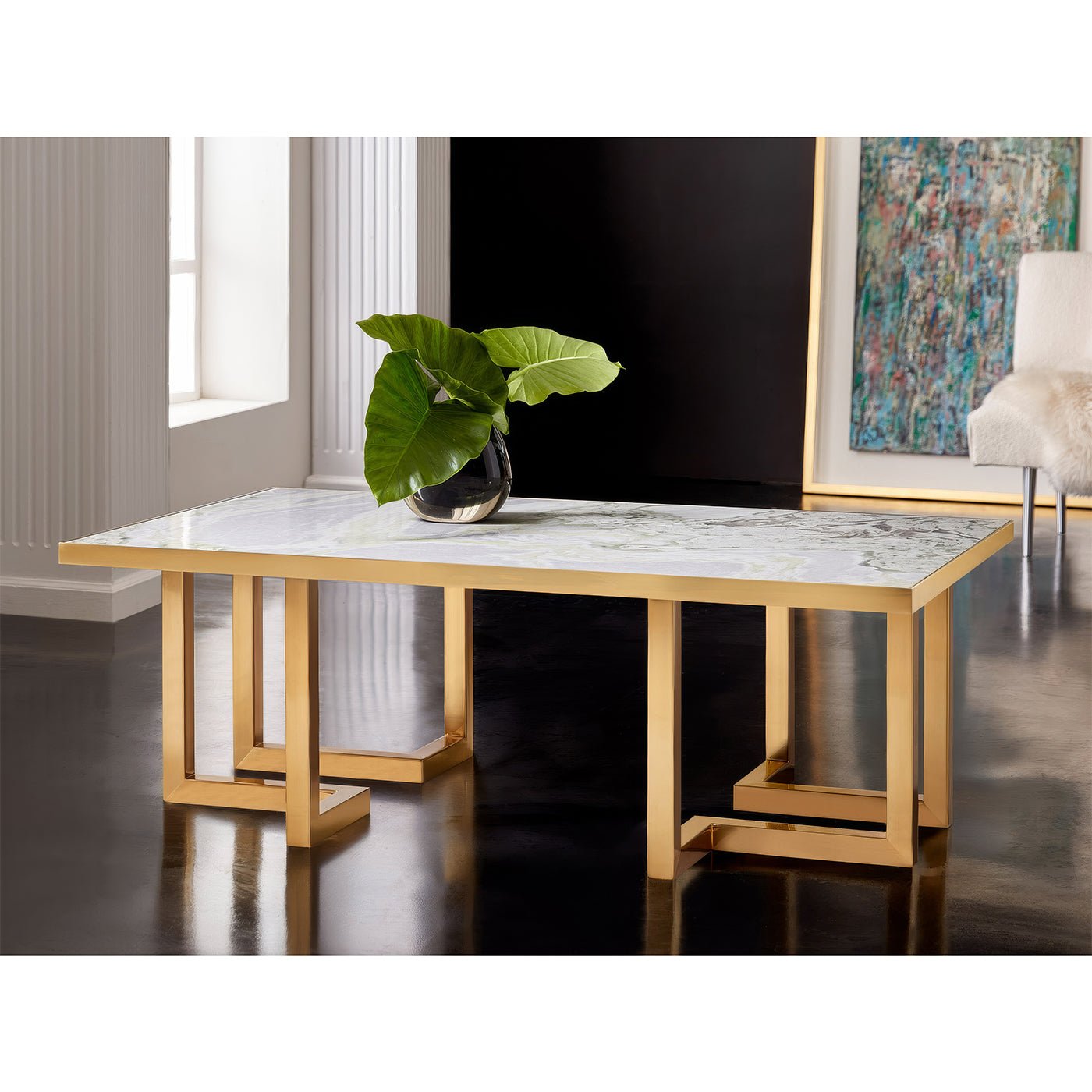 Modern coffee table with marble design, living room setting.