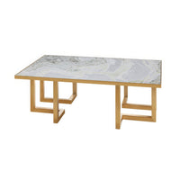 Onyx top coffee table with gold frame, side view.