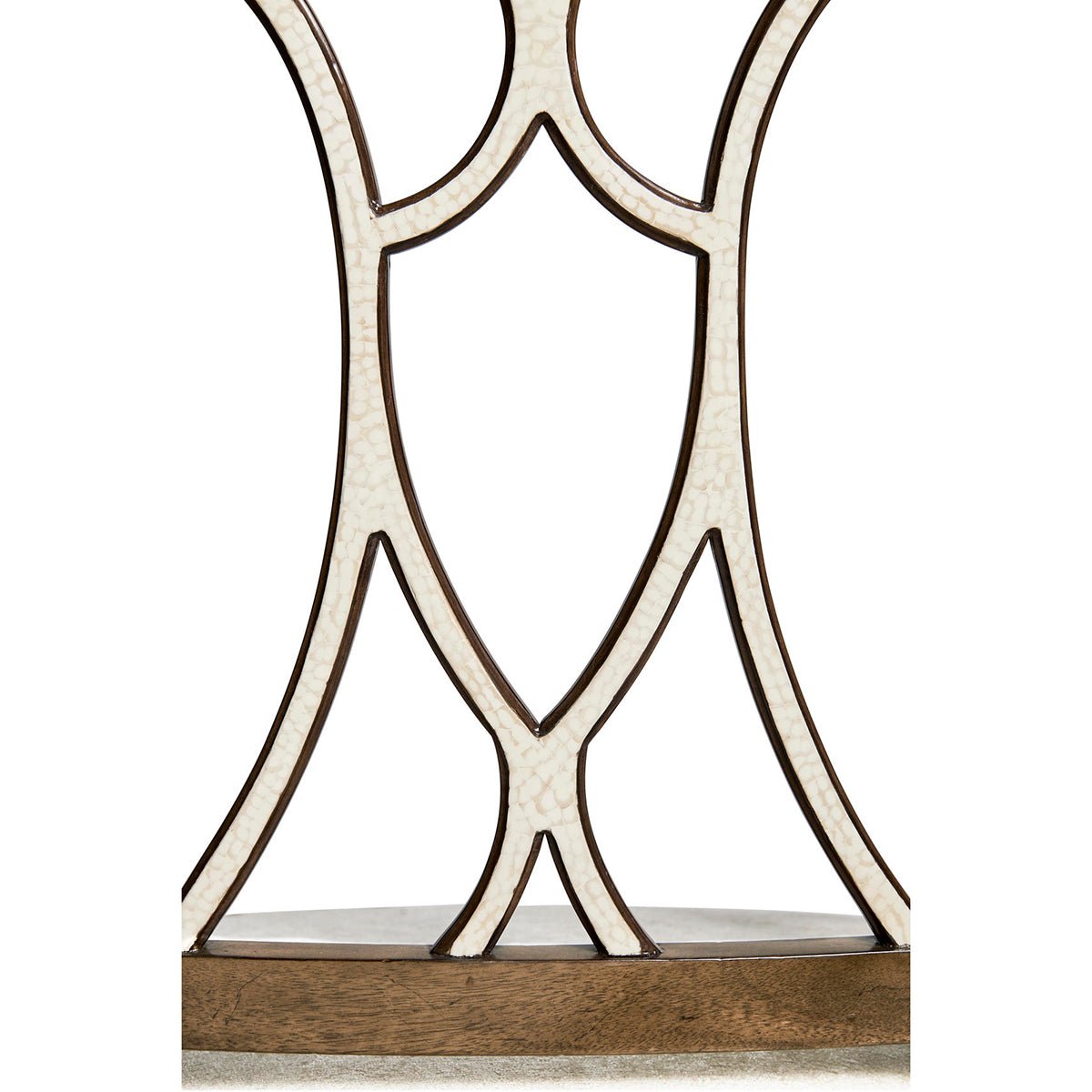 Detailed view of lattice design on armchair’s backrest.