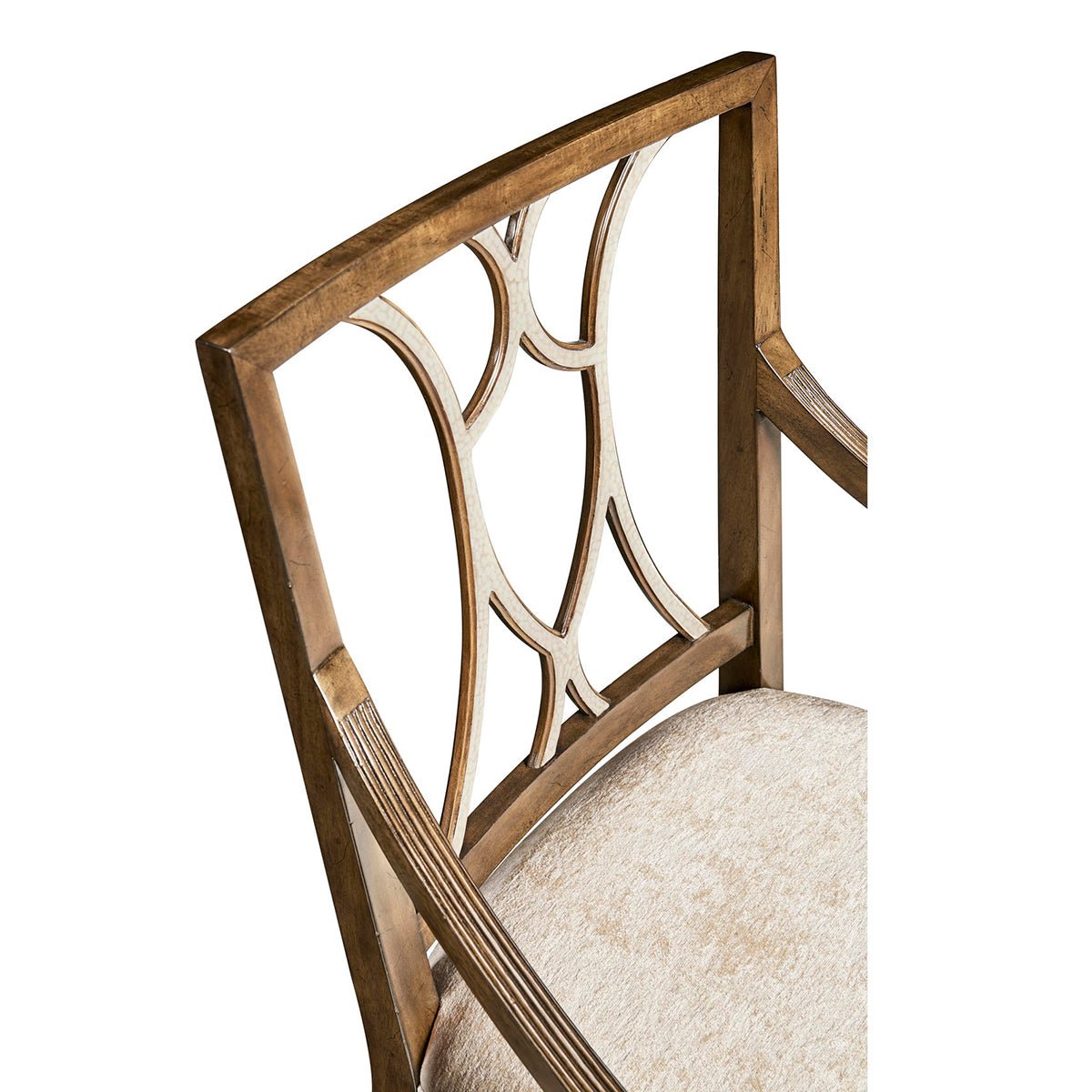 Close-up of armchair’s lattice backrest with wood finish.