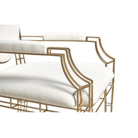Armrest details on elegant openwork steel chair.