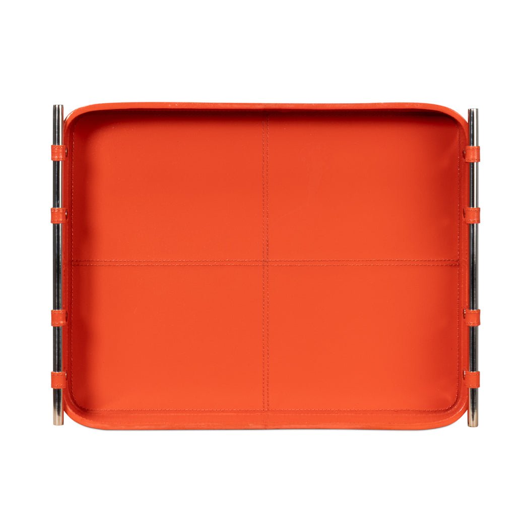 Top-down view of orange leather tray and compartments.