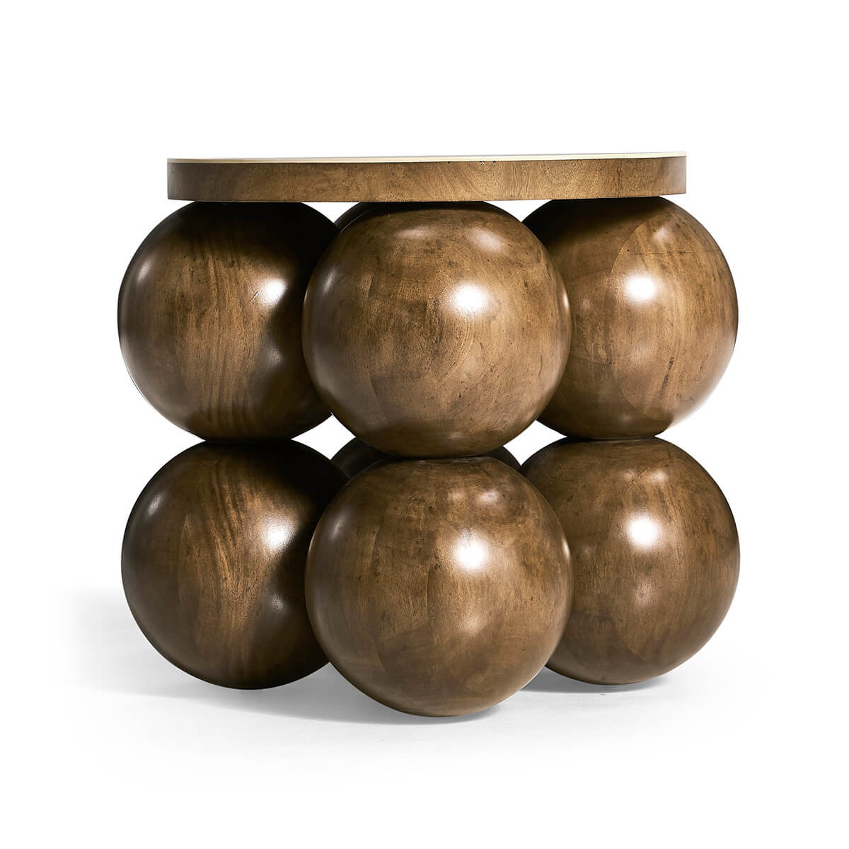 Front view of wood accent table with orb design.