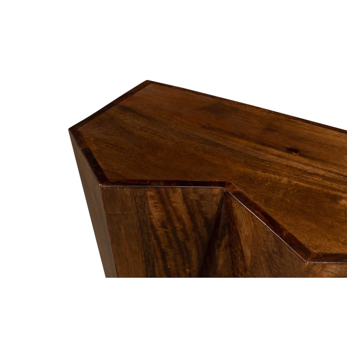 Close-up of console table's wooden texture and sharp angles.