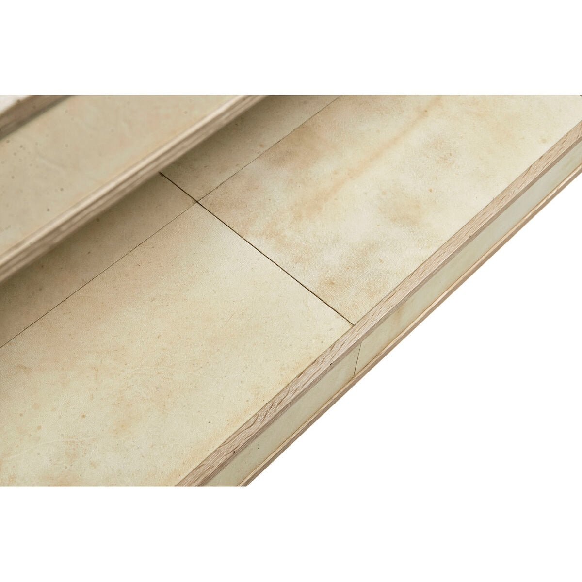 Detailed view of organic console table lower shelf.