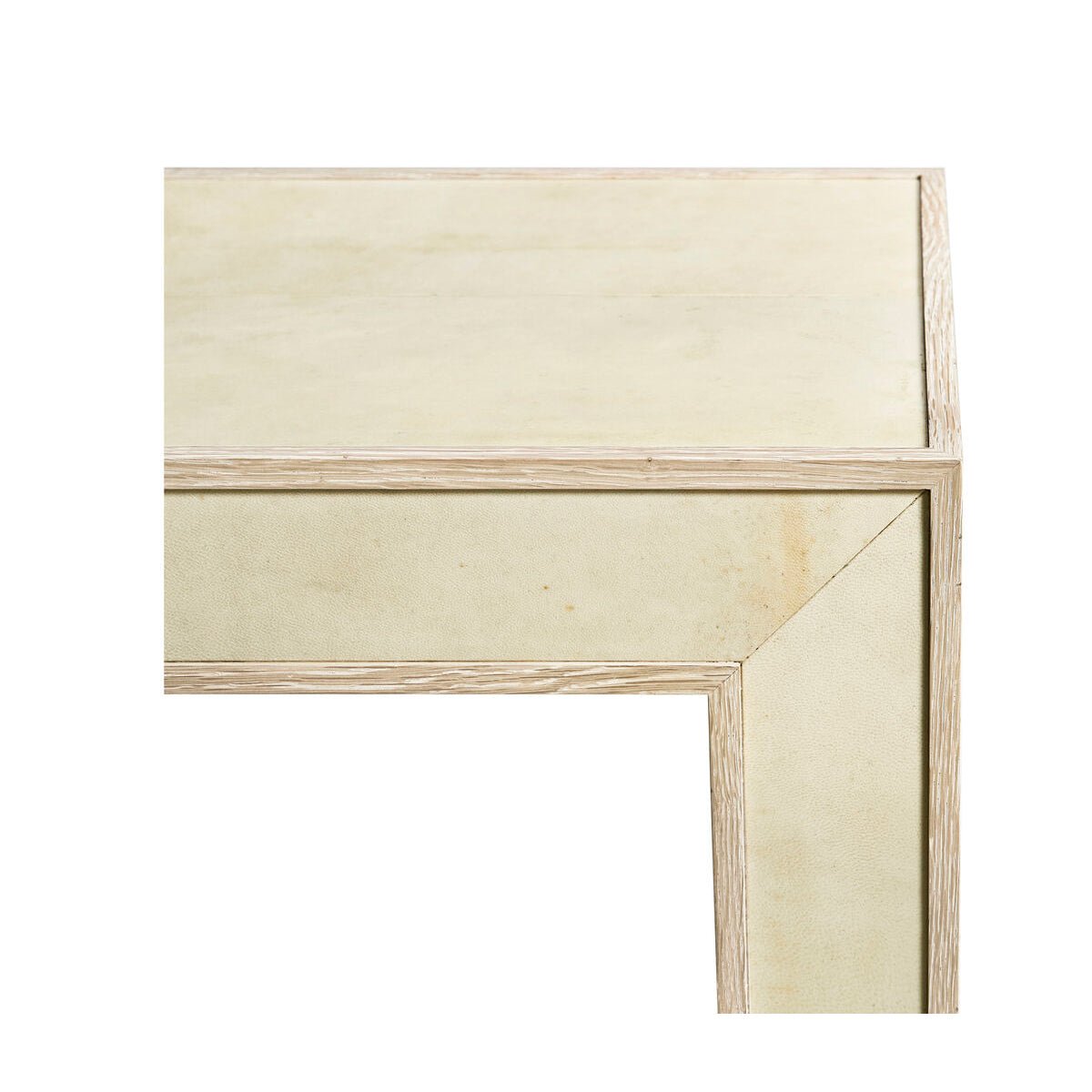 Edge detail of organic console table surface.