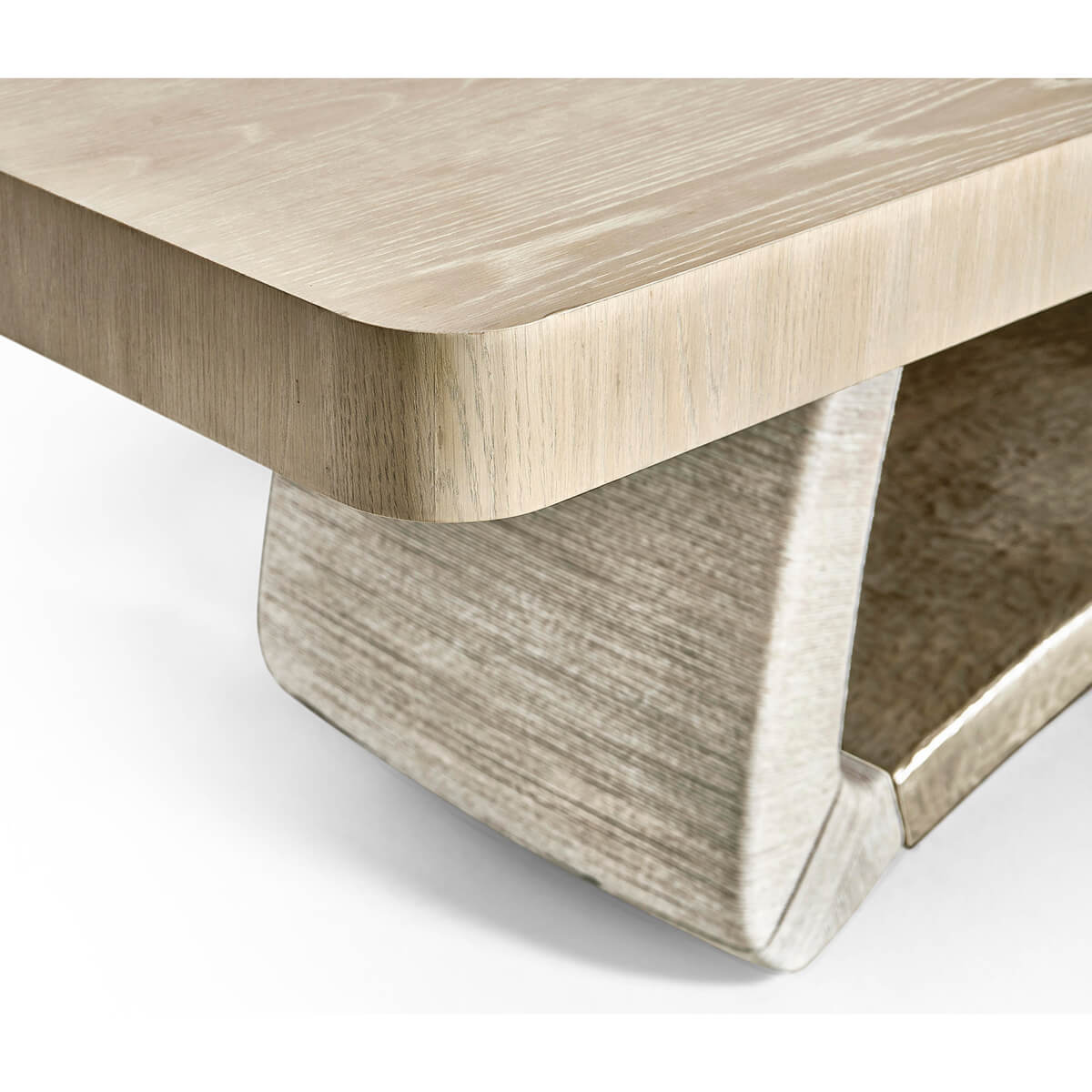Dining table corner with textured base, side detail.
