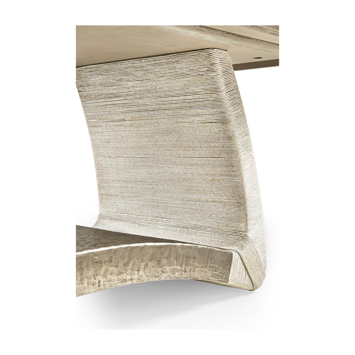 Close-up of dining table base and curve.