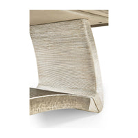 Close-up of dining table base and curve.