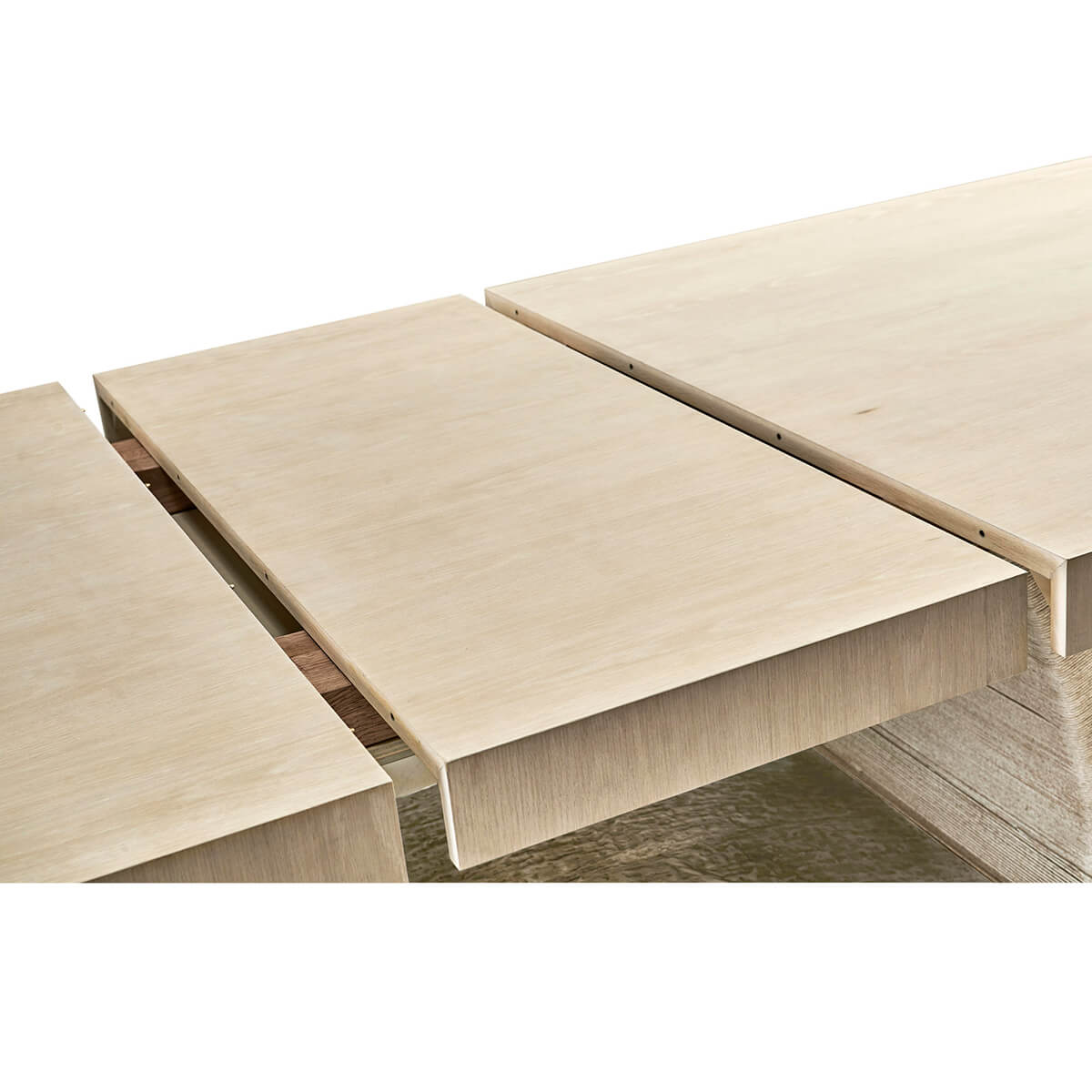 Dining table with extending middle section, side view.
