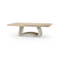 Dining table with curved base, angled view.