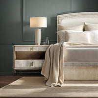 Partial view of Danish cord king bed with nightstand.