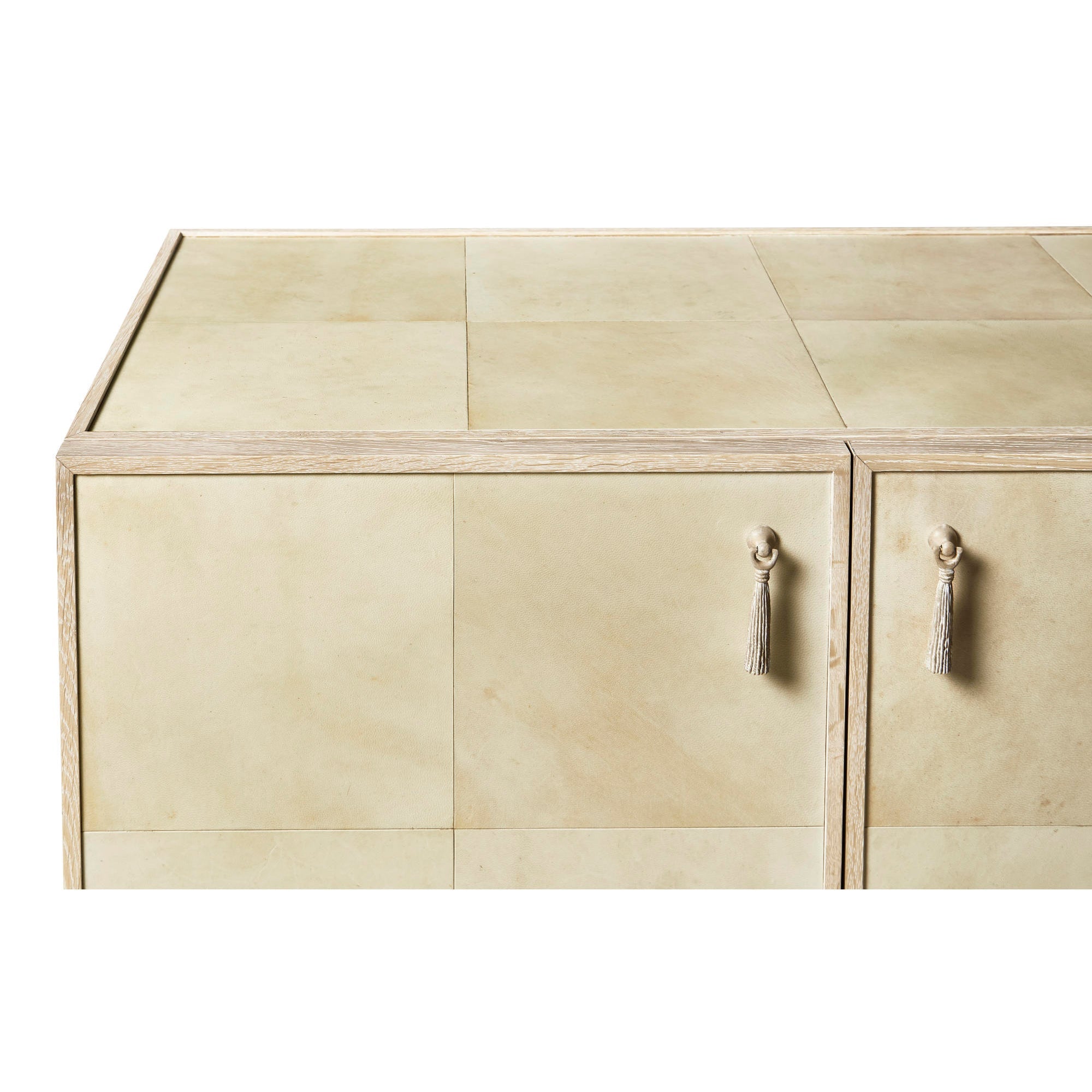 Side detail of console showcasing cabinet handles and finish.