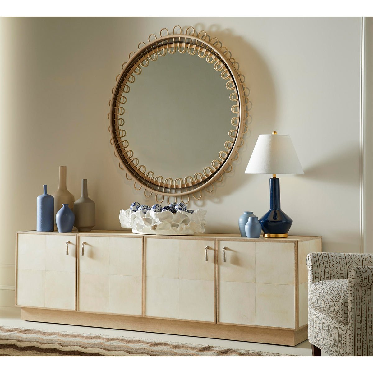 Console styled with decor in a living room setting.