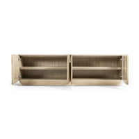 Interior of entertainment console featuring open shelving.