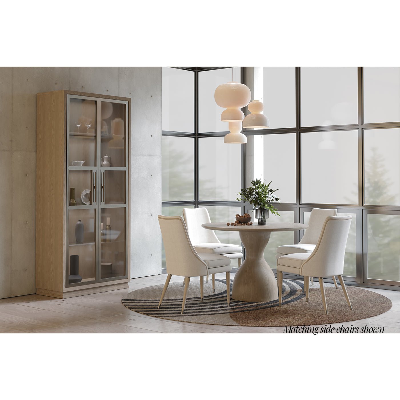 Cream linen armchairs, dining room setup around table.