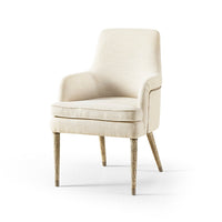 Cream linen armchair, angled front view, wooden legs.