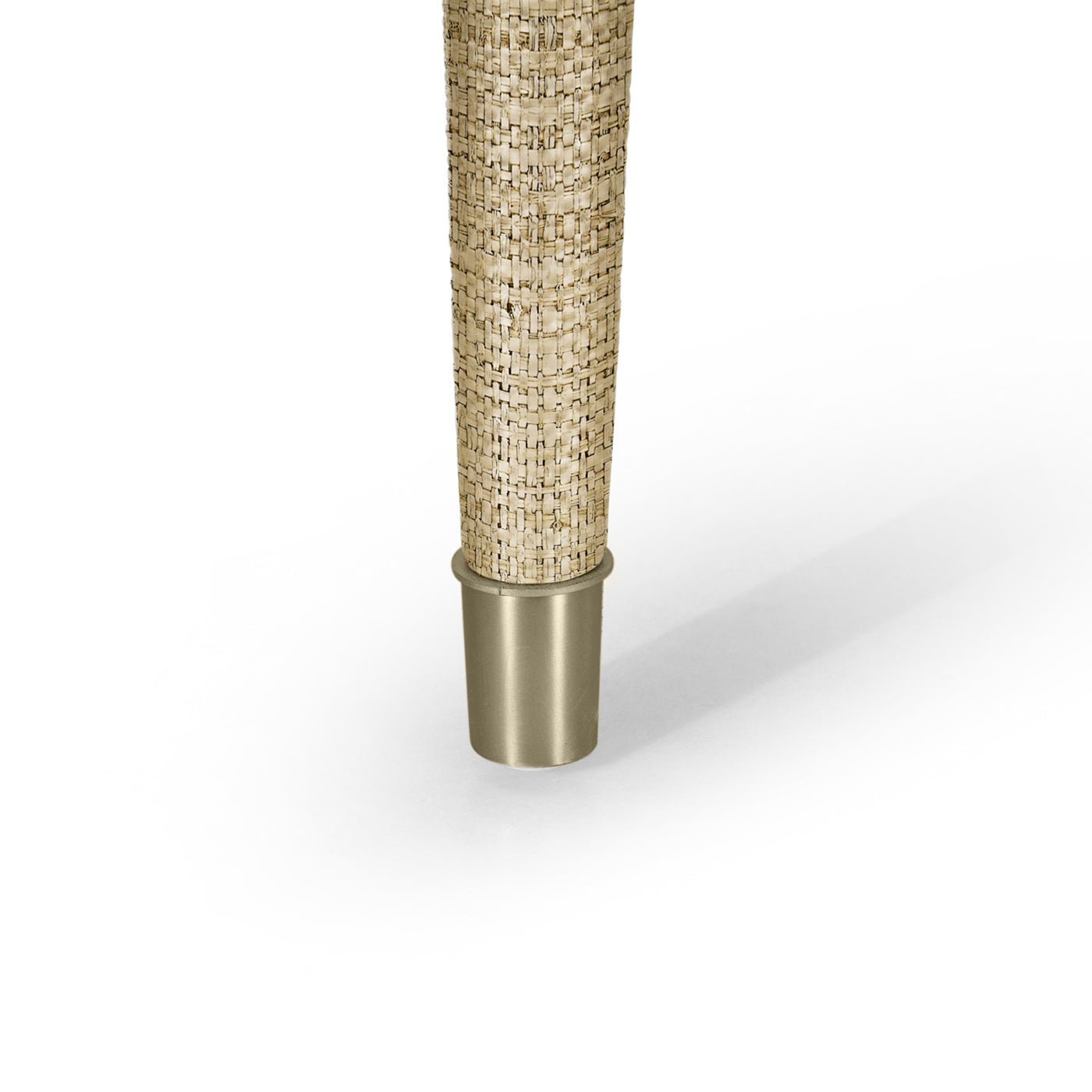 Close-up of metal-tipped chair leg.