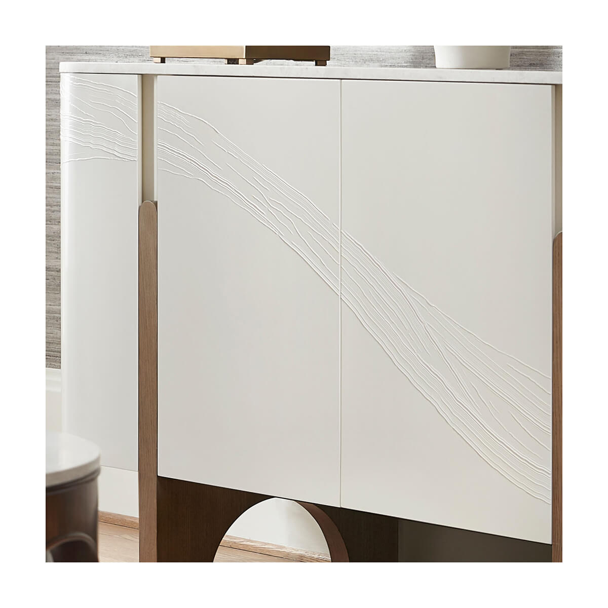 Close-up of cabinet doors with subtle textured design.