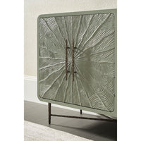 Textured media cabinet corner detail with metal handles.
