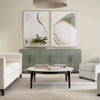 Media cabinet in stylish living room setting.