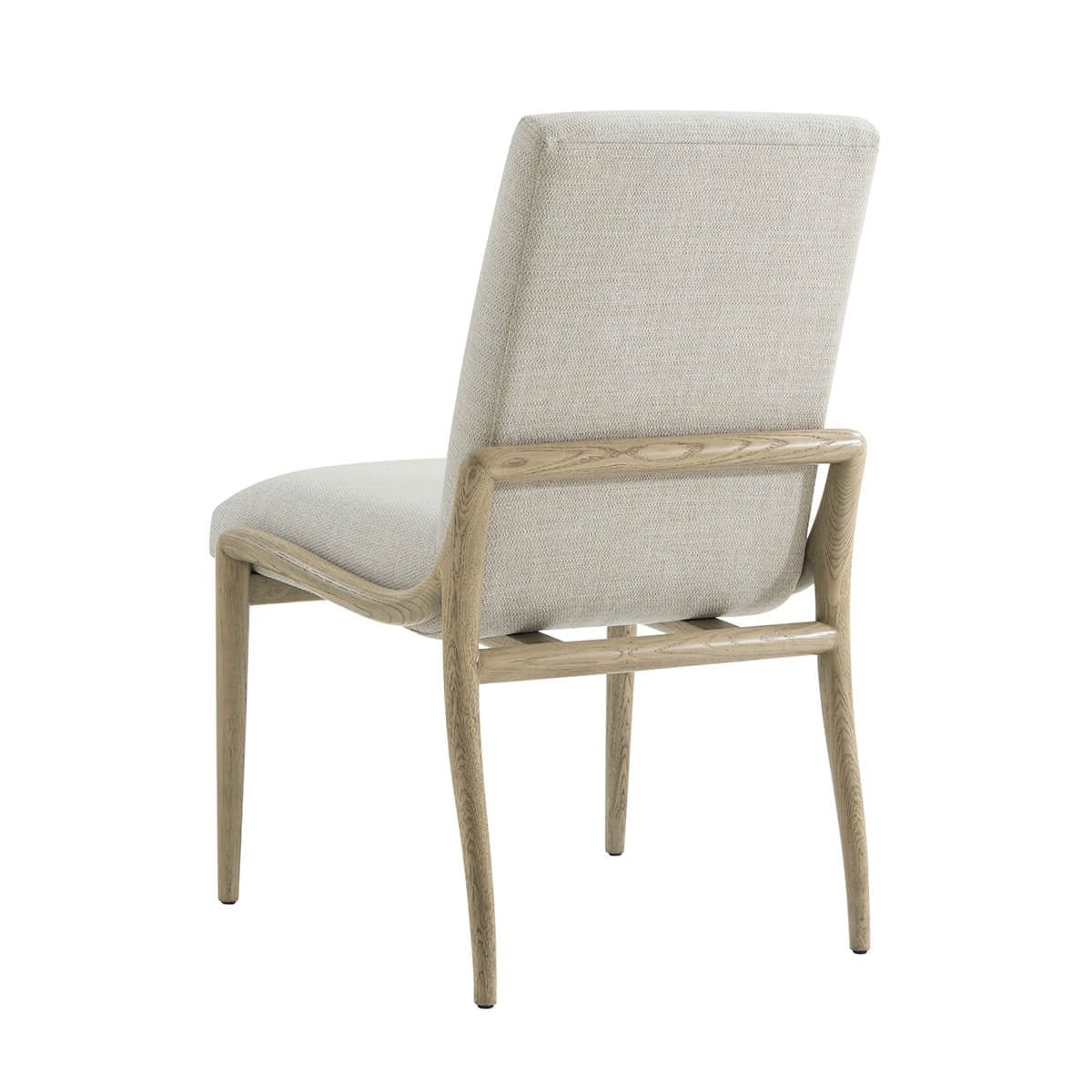 Back view of dining chair with light wood frame.