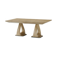 Angled view oak table with extending feature.