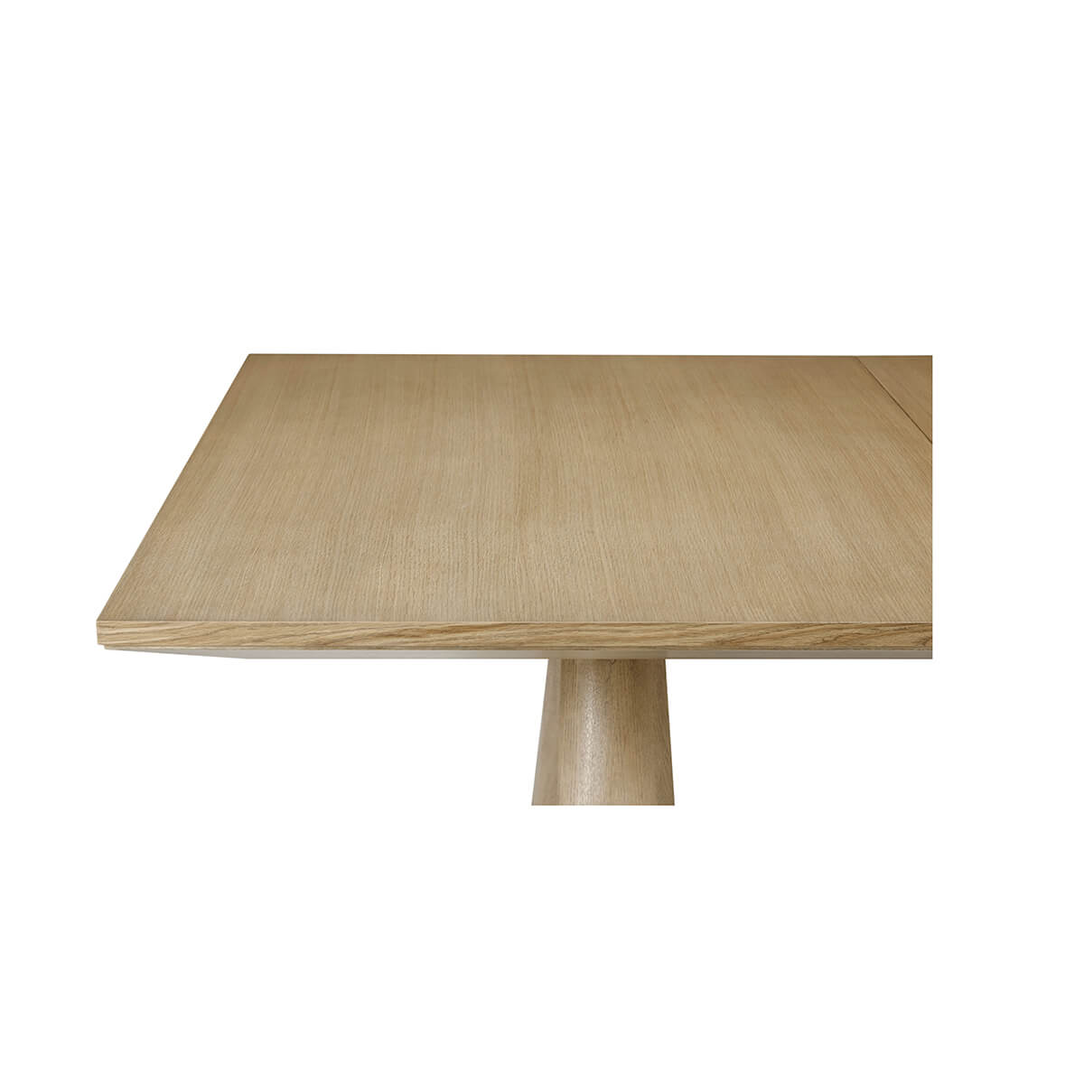 Corner view of tabletop on oak extending dining table.