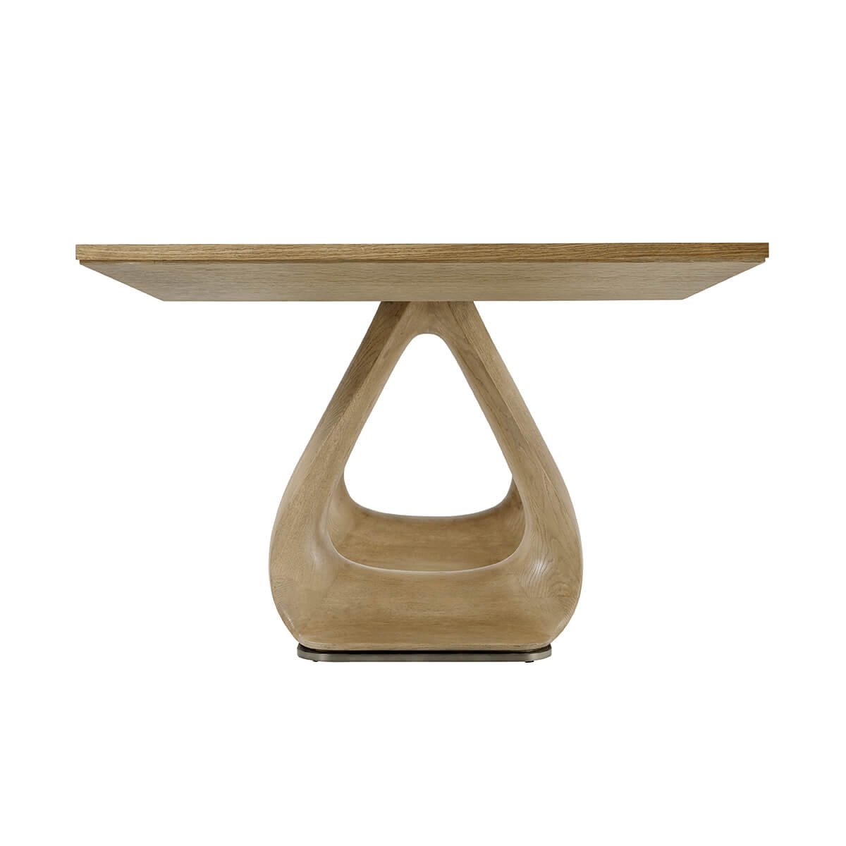 Close-up of pedestal base on oak extending dining table.