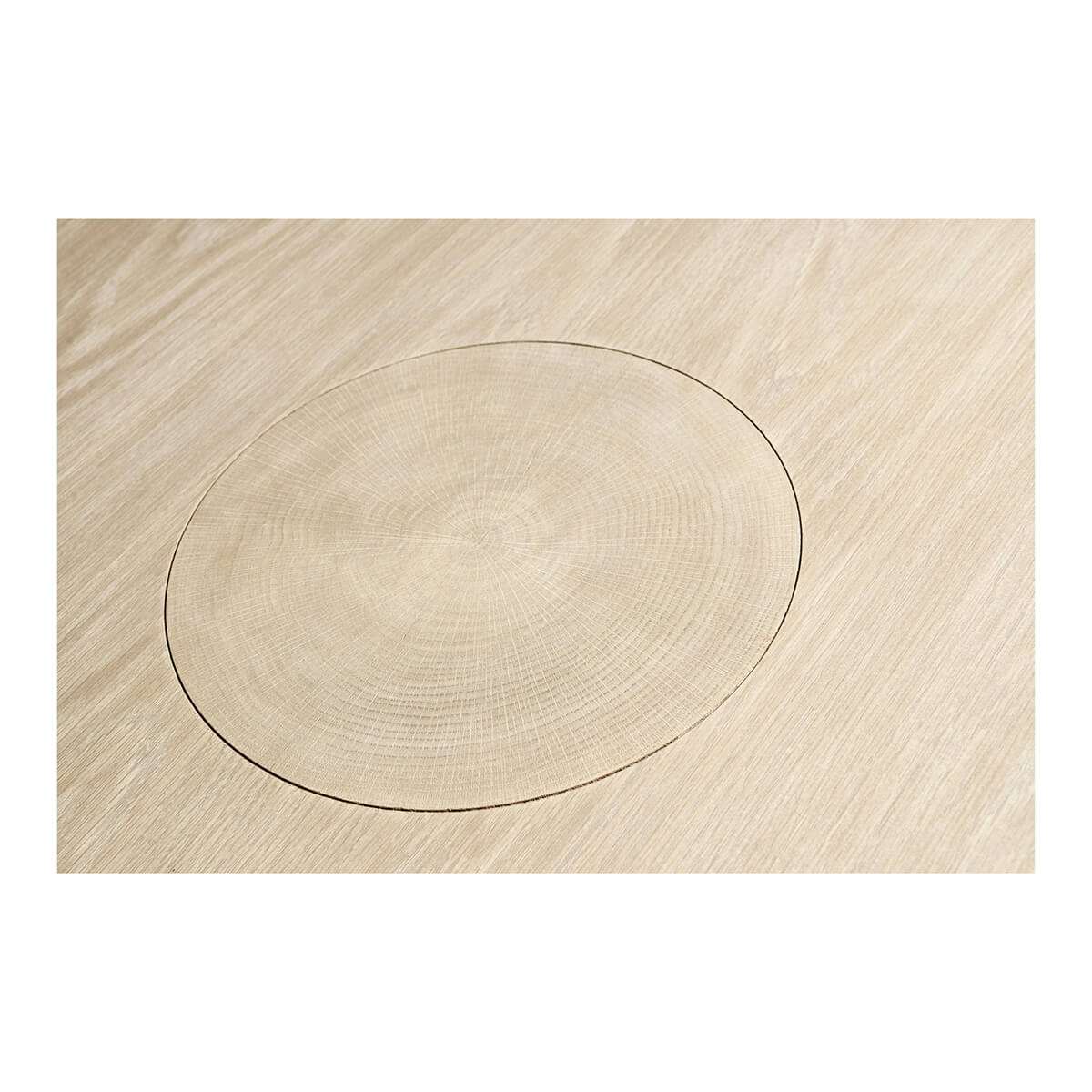 Close-up of tabletop with circular design detail.