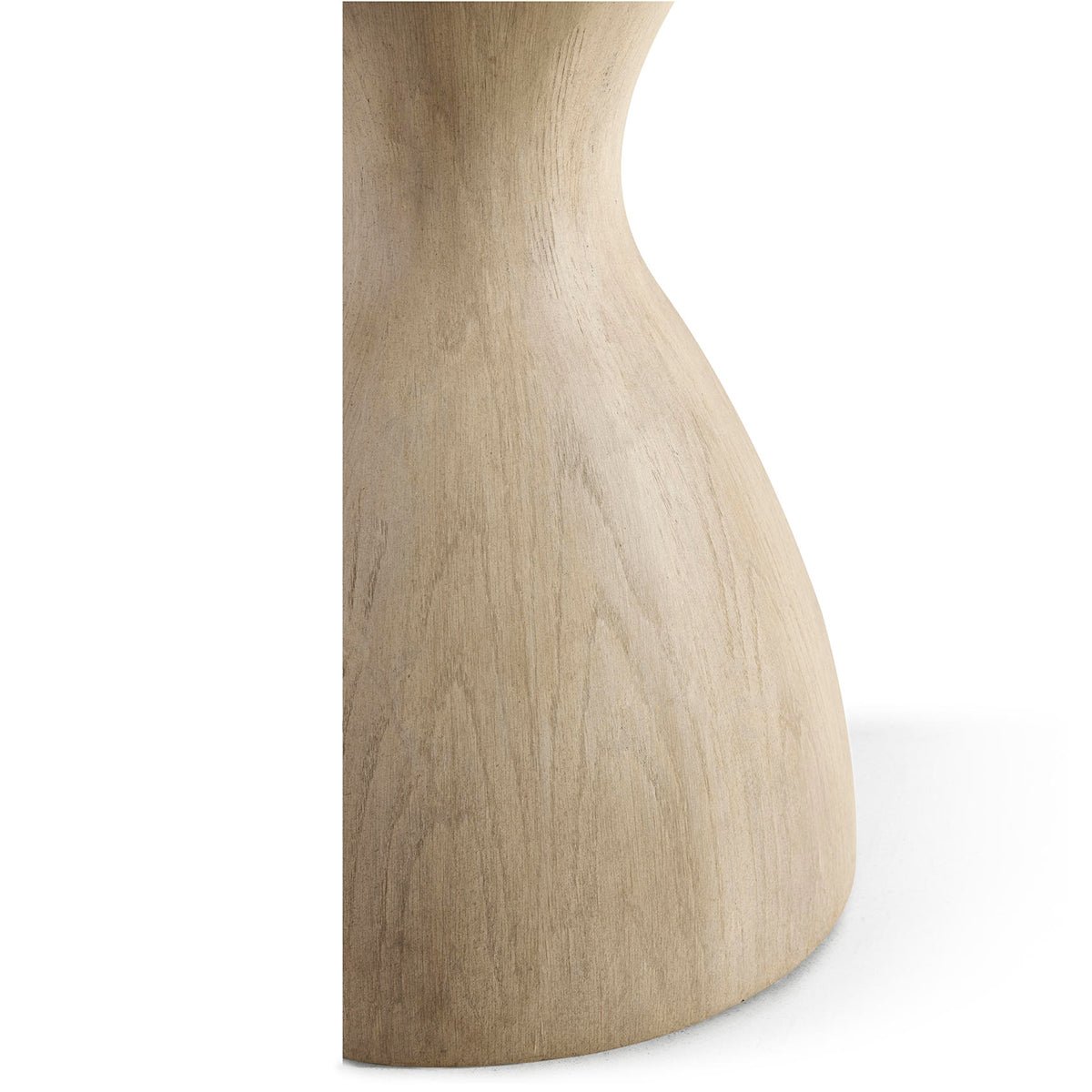 Side detail of oak pedestal table's base.