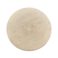 Top view of round oak dining table.