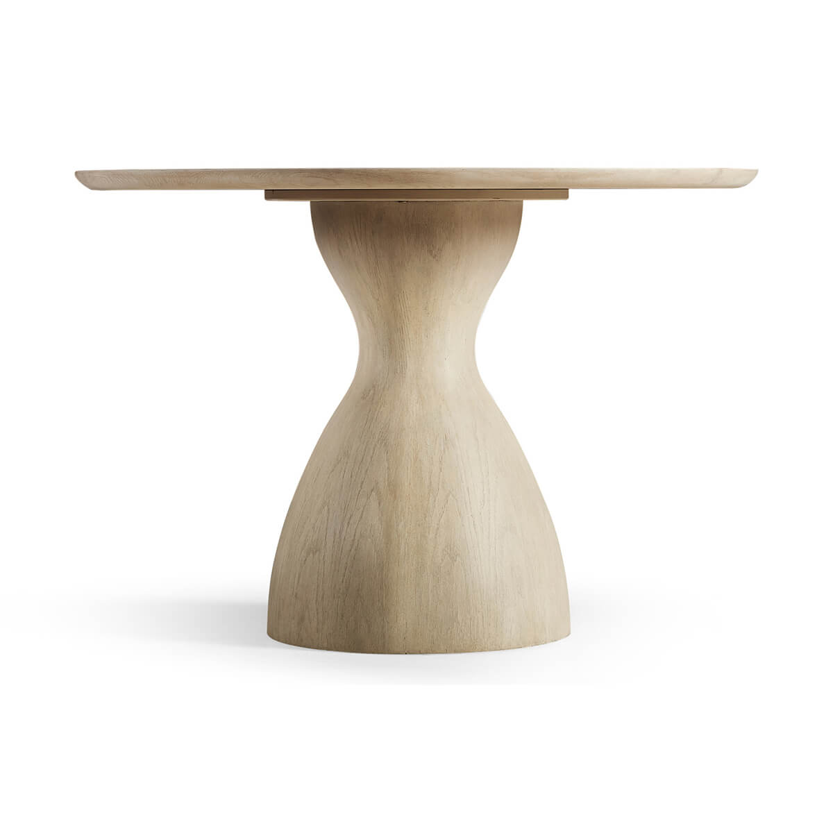 Side view of oak pedestal dining table.