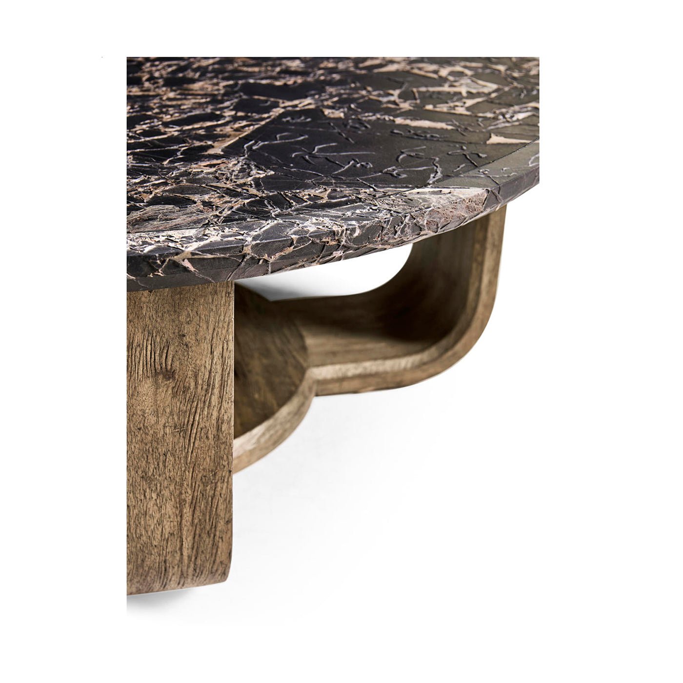 Close-up of marble top and wood base connection.