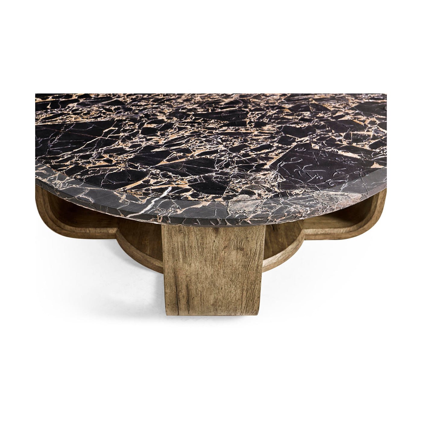 Marble coffee table, partial overhead view with base detail.