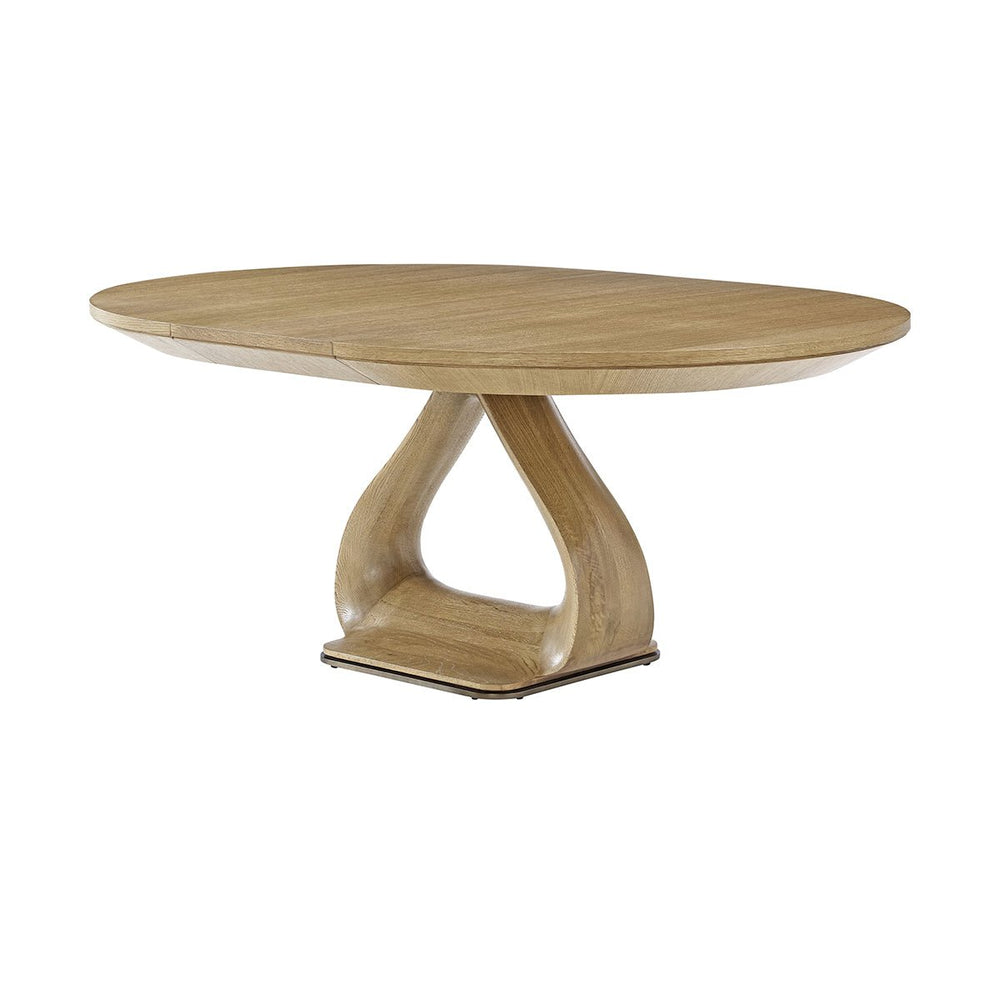 Oval oak dining table, side angle view, extending feature