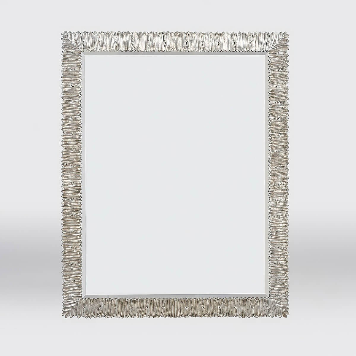 Close-up of silver gilt mirror, emphasized texture.