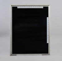 Back panel of silver gilt mirror, mounting features.