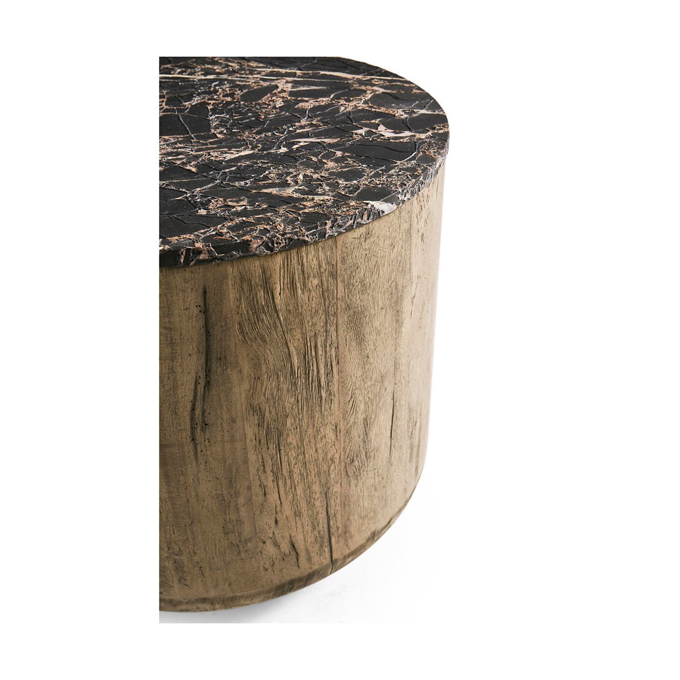Partial view of stone-topped organic wood accent table.