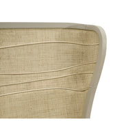 Close-up of headboard texture on organic modern king bed.