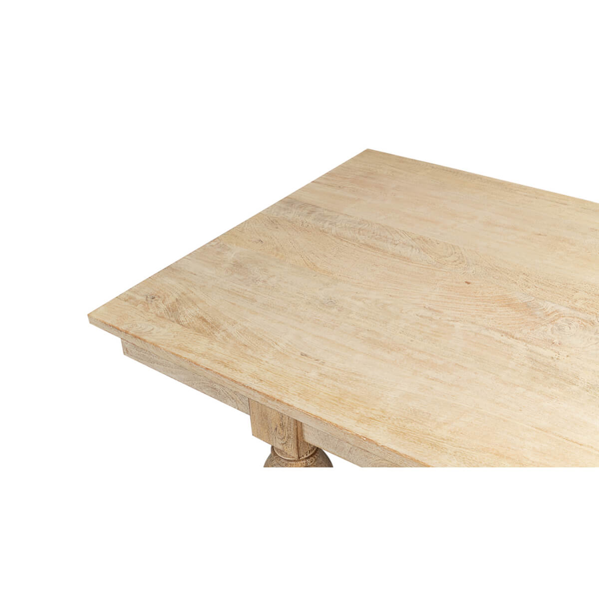 Close-up of dining table top, natural wood grain.