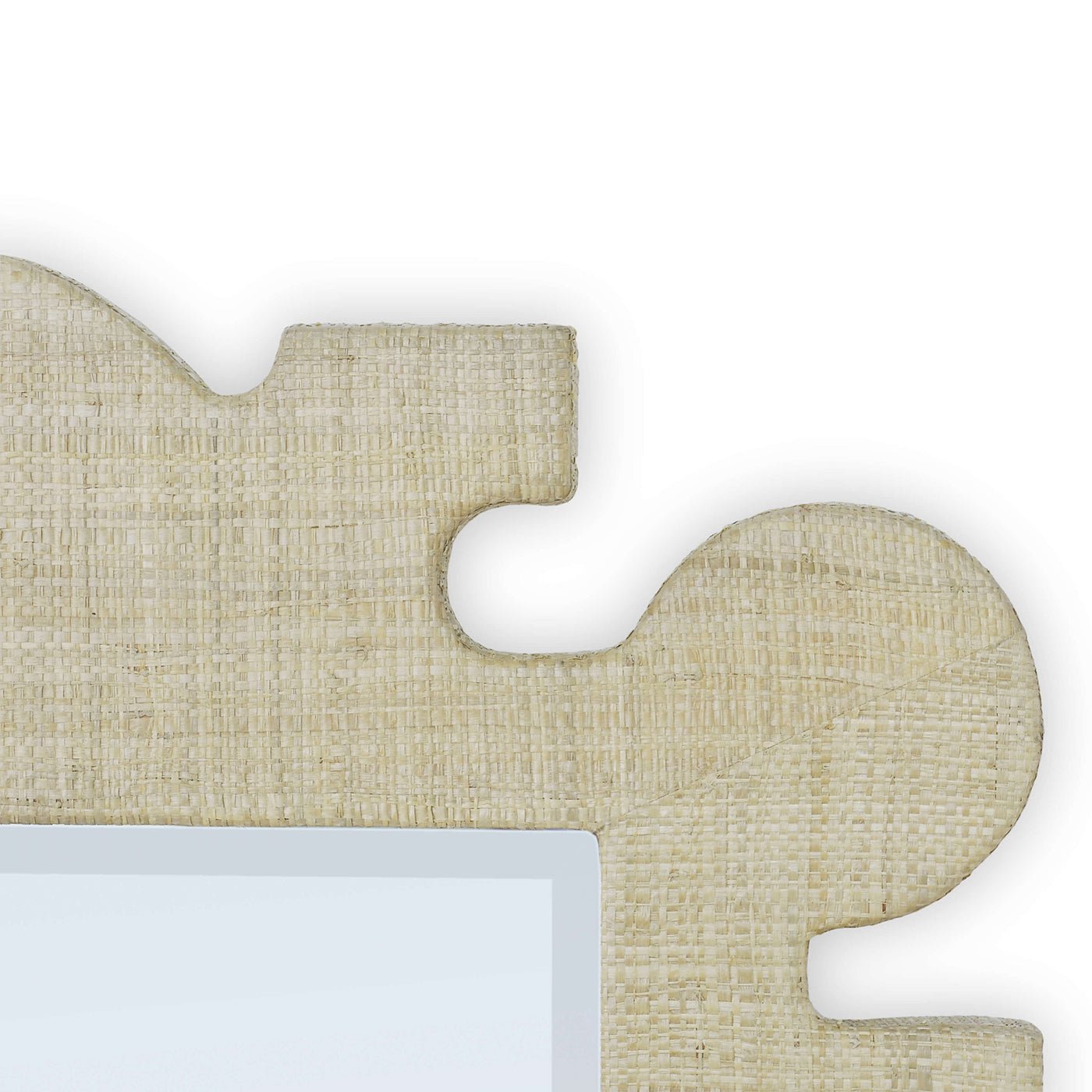 Close-up of unique corner detail on raffia mirror.