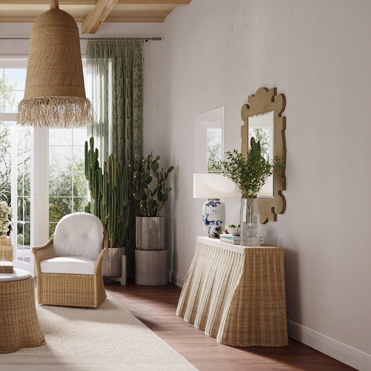 Living room decor with raffia mirror over console.
