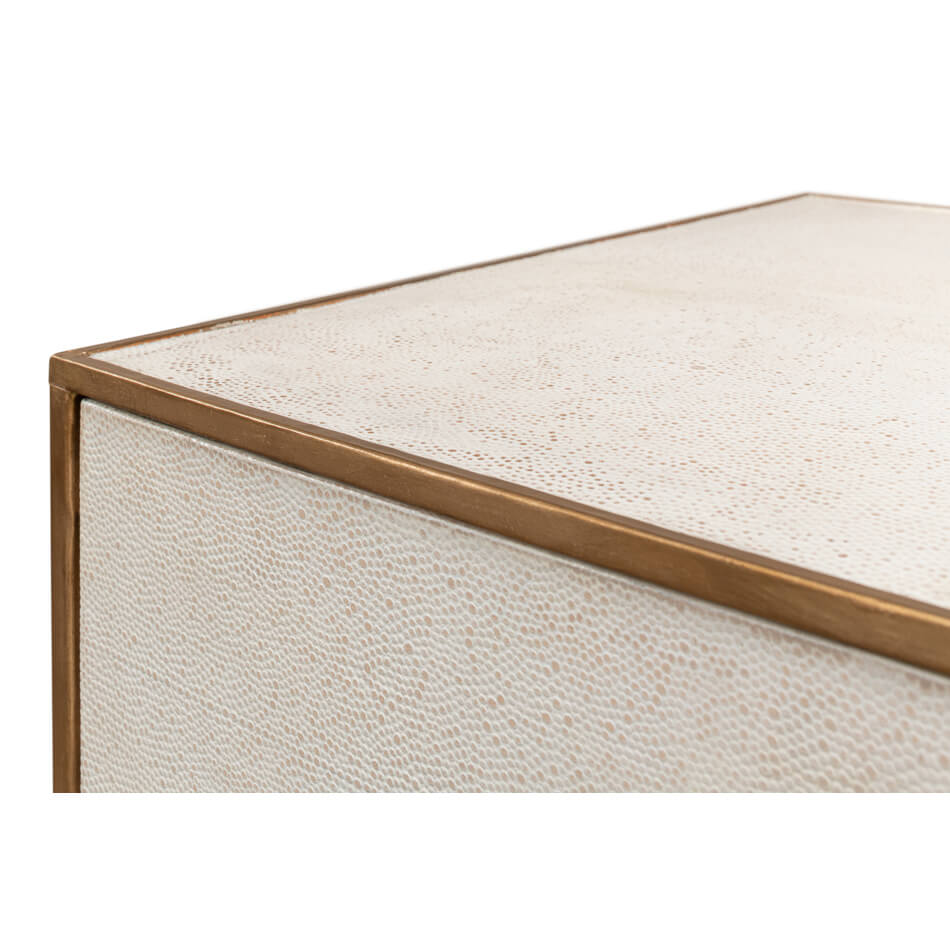 Modern end table corner detail with metal trim.