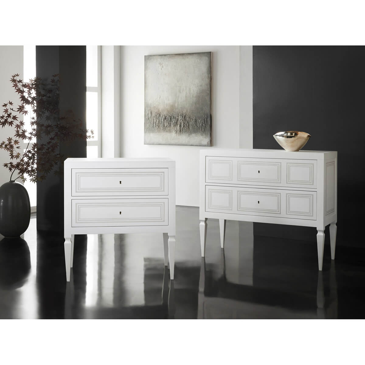 Pair of white bedside chests in modern interior setting.